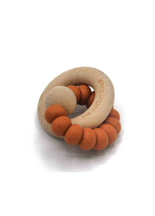 Teether avec une bague en bois, caramel