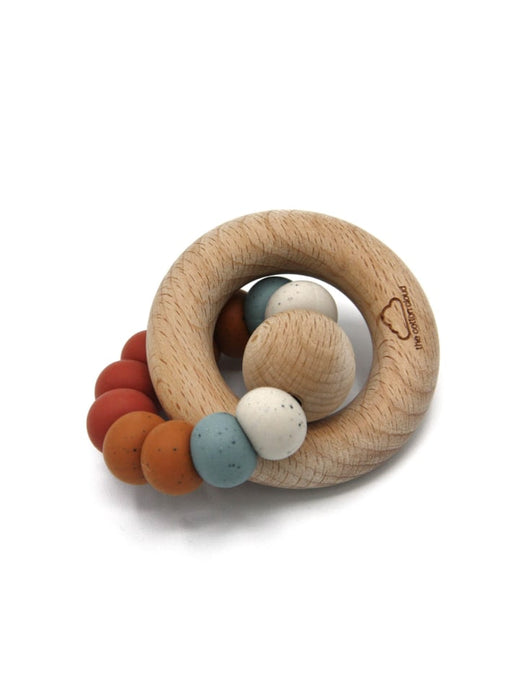 Teether avec une bague en bois, rétro